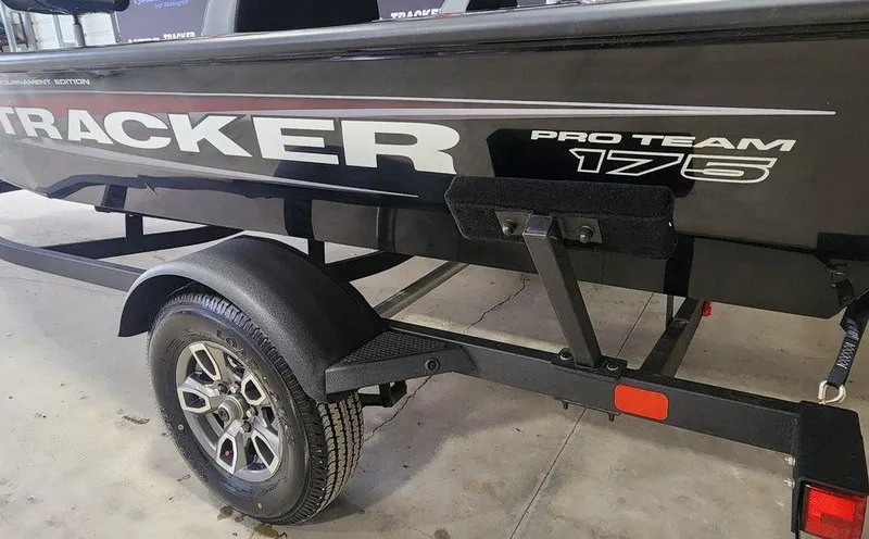 Slide: The Image of 2025 Tracker Pro Team 175 Tournament Edition boat on trailer, side view. - 10