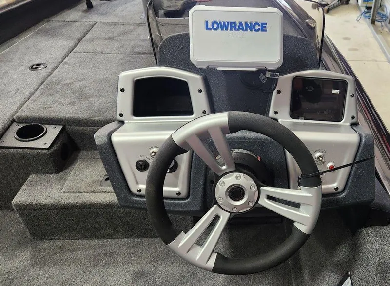 Slide: The Image of 2025 Tracker Pro Team™ 175 Tournament Edition boat dashboard with Lowrance electronics. - 3