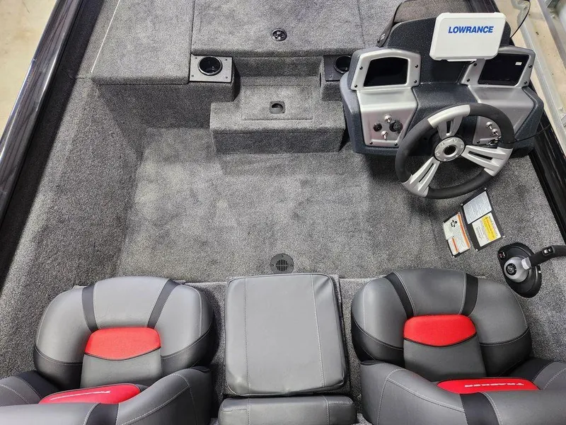 Slide: The Image of 2025 Tracker Pro Team™ 175 Tournament Edition boat interior with steering wheel and seating. - 5