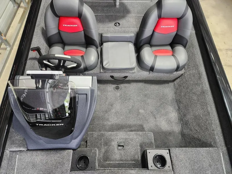 Slide: The Image of 2025 Tracker Pro Team™ 175 Tournament Edition boat interior with dual seats and steering console. - 8