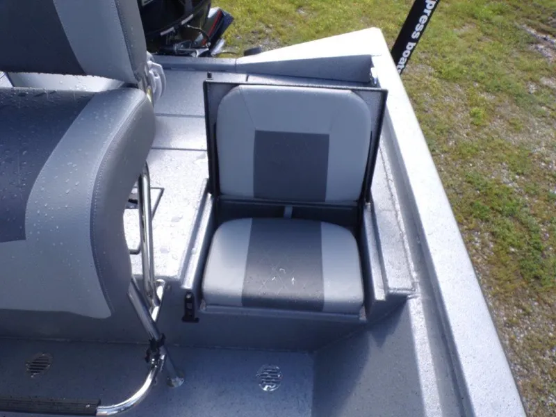 Slide: The Image of 2025 Xpress H20BAY boat seat with gray upholstery, featuring a foldable design. - 20