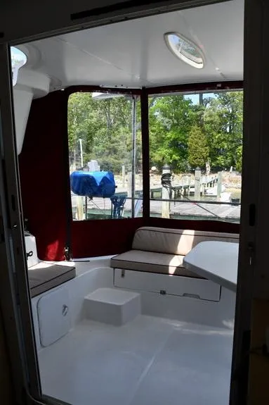 Slide: The Image of Interior view of 2014 Fountaine Pajot Mahe 36 Evolution catamaran with seating and outdoor scenery. - 18