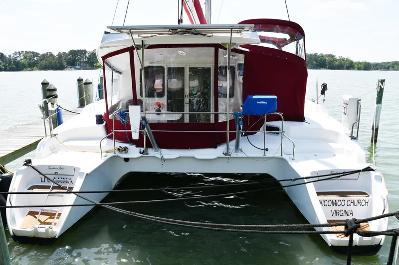 Slide: The Image of 2014 Fountaine Pajot Mahe 36 Evolution catamaran docked in Virginia marina. - 2
