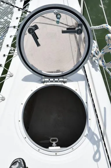Slide: The Image of Open hatch on 2014 Fountaine Pajot Mahe 36 Evolution catamaran deck. - 27