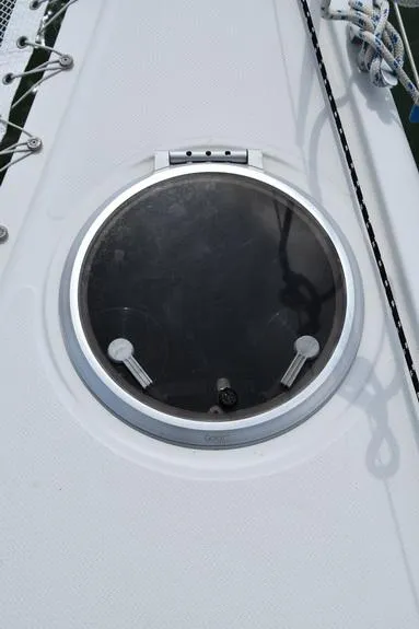 Slide: The Image of Round hatch on 2014 Fountaine Pajot Mahe 36 Evolution catamaran deck. - 28