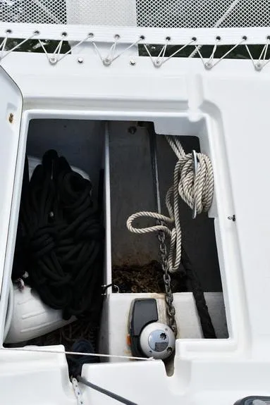 Slide: The Image of Anchor locker of 2014 Fountaine Pajot Mahe 36 Evolution catamaran with ropes and chains. - 31