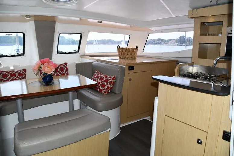 Slide: The Image of Interior of 2014 Fountaine Pajot Mahe 36 Evolution catamaran with dining area and kitchen. - 37
