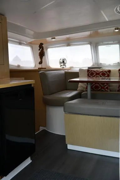 Slide: The Image of Interior of 2014 Fountaine Pajot Mahe 36 Evolution catamaran, featuring cozy seating and modern decor. - 40