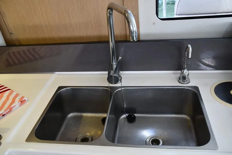 Slide: The Image of Double sink in 2014 Fountaine Pajot Mahe 36 Evolution catamaran kitchen. - 49