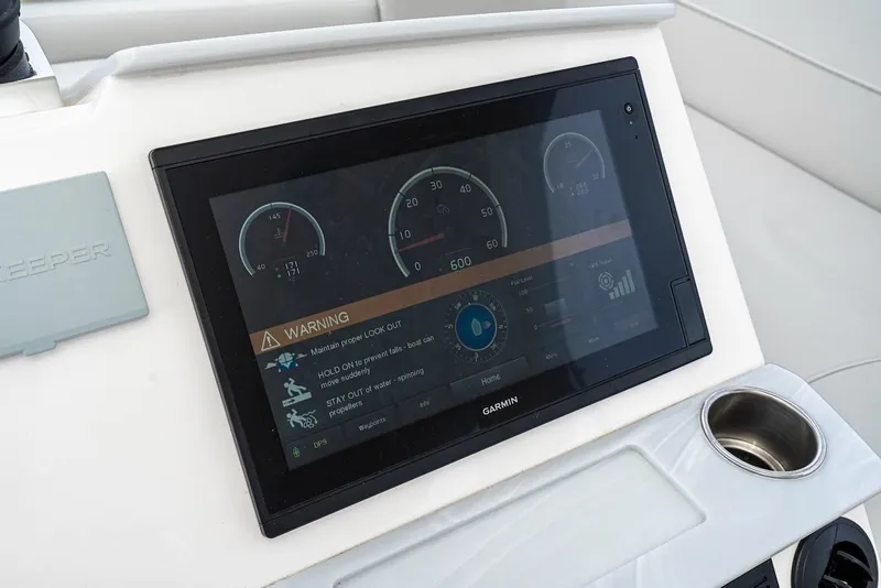 Slide: The Image of Garmin display on 2019 Tiara Yachts F 53 dashboard with warning indicators. - 21
