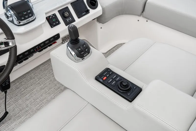 Slide: The Image of 2019 Tiara Yachts F 53 helm controls with joystick and navigation system. - 22