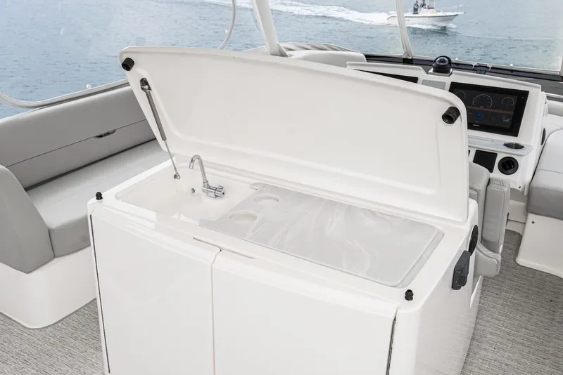 Slide: The Image of 2019 Tiara Yachts F 53 interior with open sink and seating area. - 24