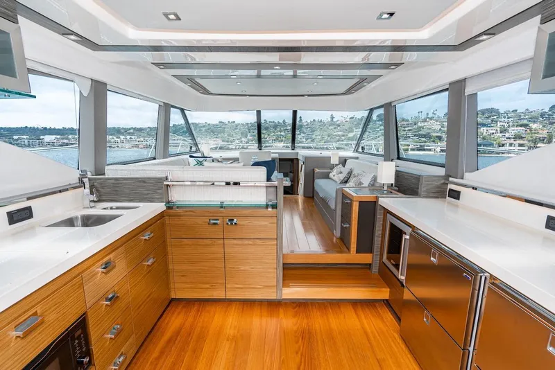 Slide: The Image of Luxurious interior of 2019 Tiara Yachts F 53 with modern kitchen and panoramic windows. - 38