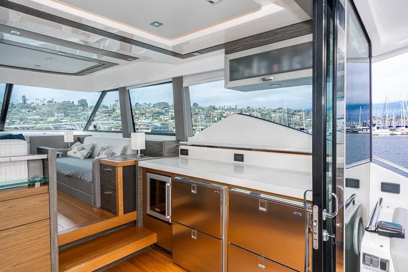 Slide: The Image of Luxurious interior of 2019 Tiara Yachts F 53 with modern design and scenic marina view. - 42