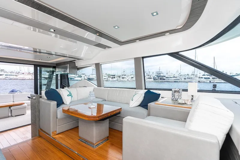 Slide: The Image of Luxurious interior of 2019 Tiara Yachts F 53 with elegant seating and waterfront view. - 49