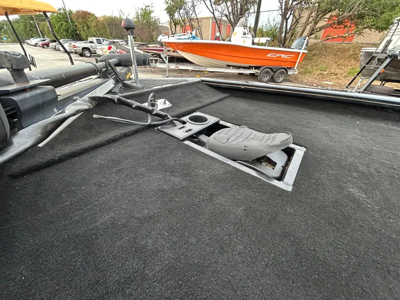 Slide: The Image of 2016 Tracker Pro Team 175 TXW boat deck with trolling motor and foot pedal. - 23