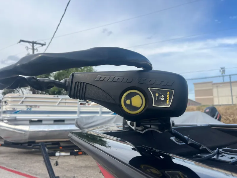 Slide: The Image of Minn Kota trolling motor on 2016 Tracker Pro Team 175 boat, outdoor setting. - 24