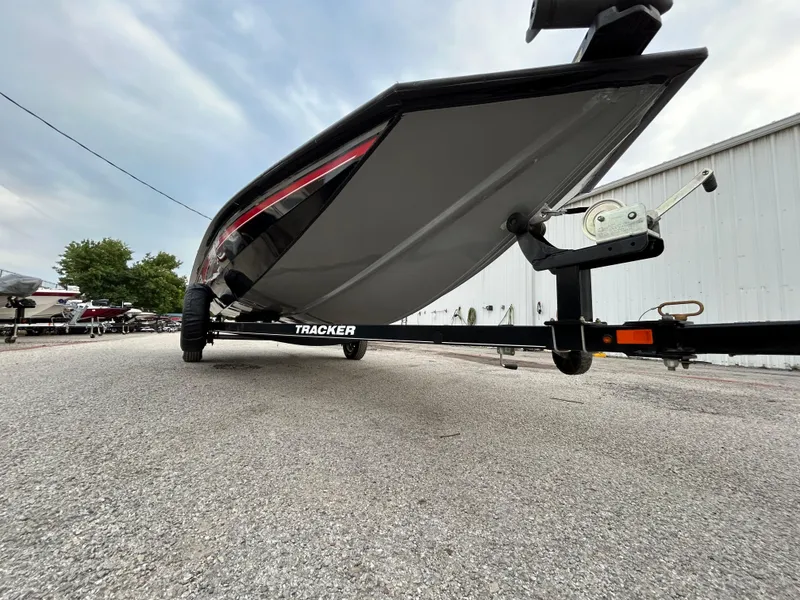Slide: The Image of 2016 Tracker Pro Team 175 TXW boat on trailer, parked outdoors. - 28