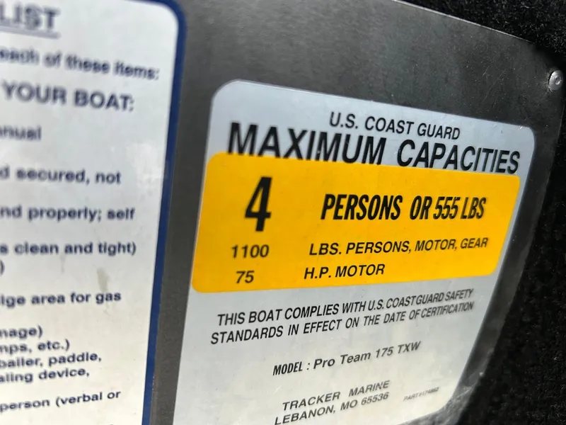 Slide: The Image of 2016 Tracker Pro Team 175 TXW capacity label: 4 persons or 555 lbs, 75 HP motor. - 33