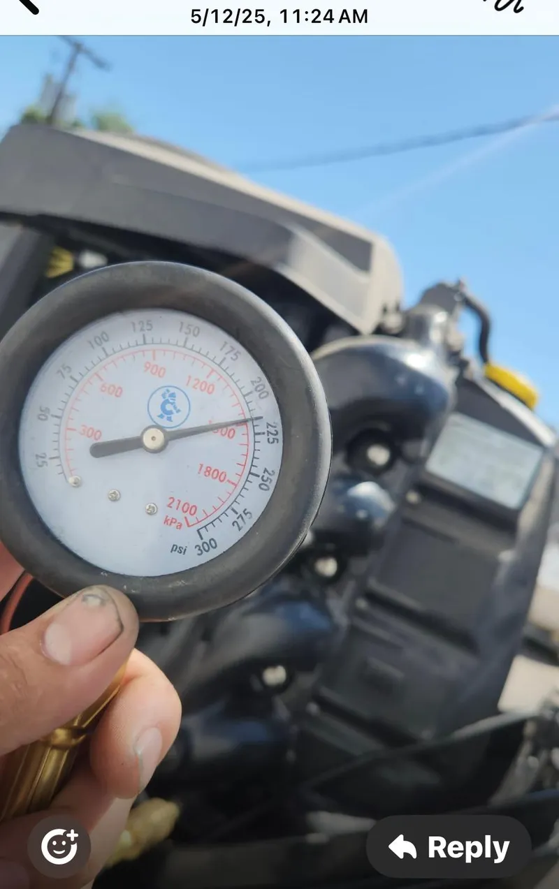 Slide: The Image of Close-up of a pressure gauge near a 2016 Tracker Pro Team 175 TXW engine. - 37