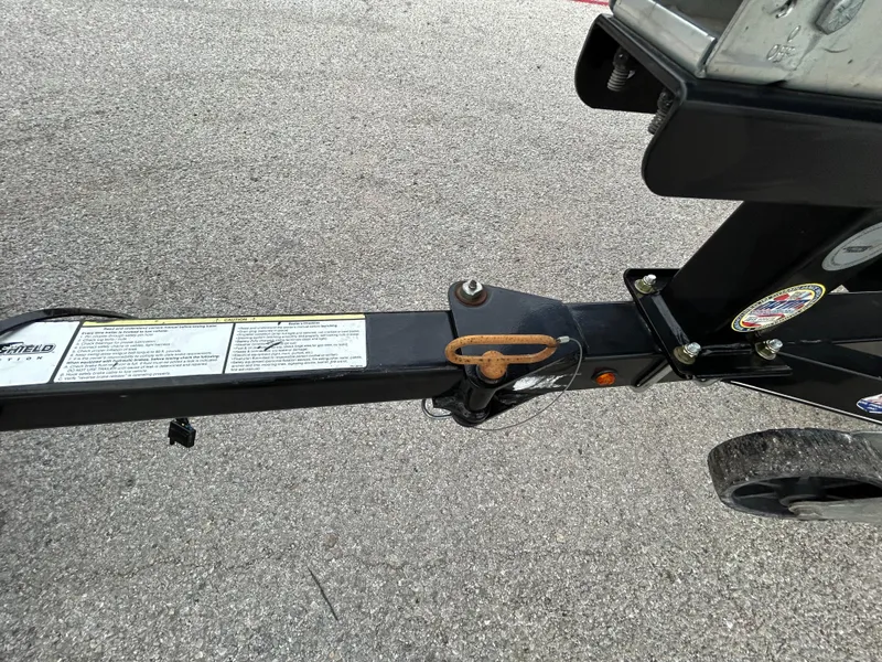 Slide: The Image of Trailer hitch of 2016 Tracker Pro Team 175 TXW on asphalt surface. - 40
