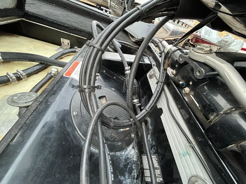 Slide: The Image of 2016 Tracker Pro Team 175 TXW boat wiring and engine components close-up. - 43