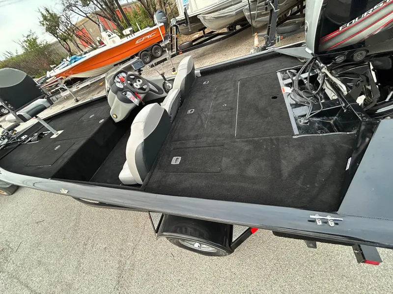 Slide: The Image of 2016 Tracker Pro Team 175 TXW boat with spacious deck and seating. - 45