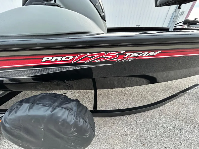 Slide: The Image of 2016 Tracker Pro Team 175 TXW boat with red and black detailing. - 49