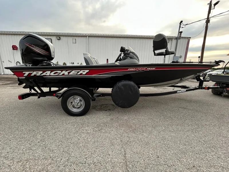 Slide: The Image of 2016 Tracker Pro Team 175 TXW boat on trailer, parked outdoors. - 5