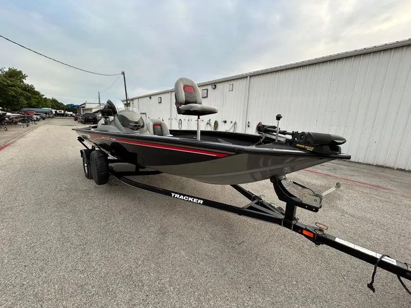 Slide: The Image of 2016 Tracker Pro Team 175 TXW boat on trailer, parked outdoors. - 51