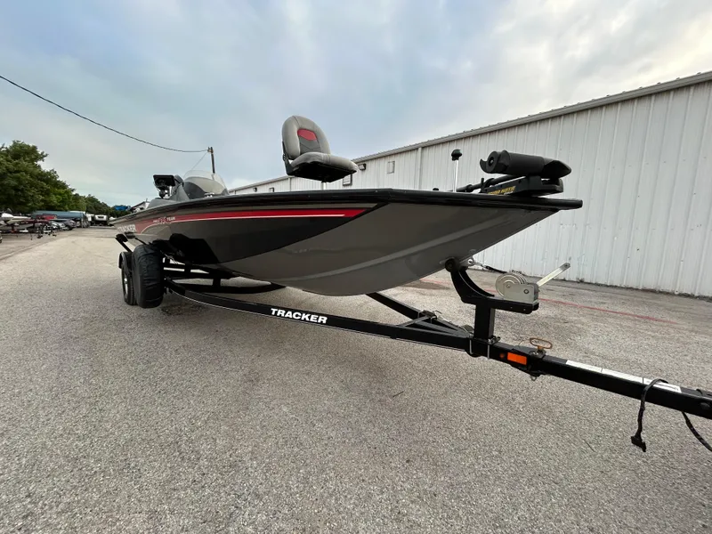 Slide: The Image of 2016 Tracker Pro Team 175 TXW boat on trailer, parked outdoors. - 52