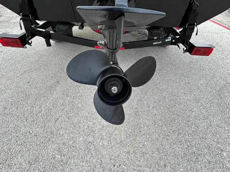Slide: The Image of Propeller of a 2016 Tracker Pro Team 175 TXW boat on a trailer. - 55