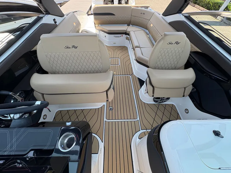 Slide: The Image of 2026 Sea Ray SLX 280 interior with luxurious seating and elegant design. - 11