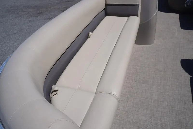 Slide: The Image of 2022 Sun Tracker Party Barge 18 DLX, beige seating area on deck. - 27