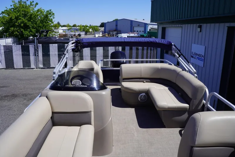 Slide: The Image of 2022 Sun Tracker Party Barge 18 DLX pontoon boat with spacious seating and canopy. - 28