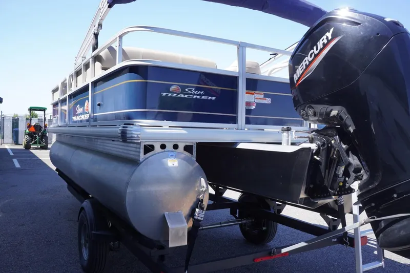 Slide: The Image of 2022 Sun Tracker Party Barge 18 DLX pontoon boat with Mercury engine on trailer. - 8