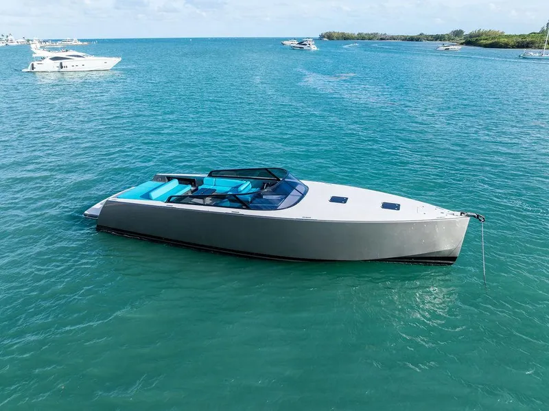 The Image of VanDutch 55 yacht, 2015 model, sleek design, anchored in turquoise waters. - 0
