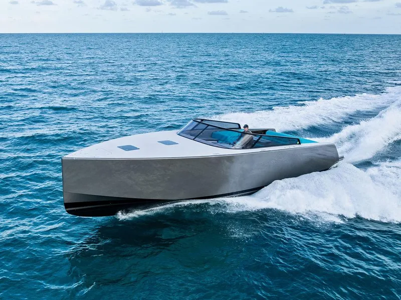 Slide: The Image of VanDutch 55 yacht cruising on open sea, 2015 model, sleek design, luxury boating experience. - 14