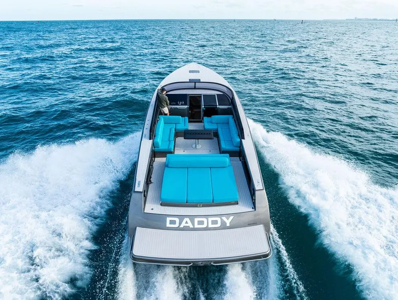 Slide: The Image of VanDutch 55 yacht cruising on open sea, 2015 model, with blue seating. - 19