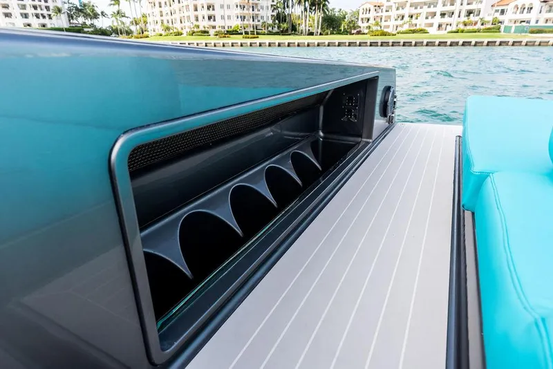 Slide: The Image of 2015 VanDutch 55 yacht interior detail with sleek storage compartment by the water. - 33