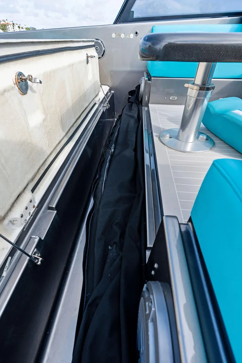 Slide: The Image of Interior view of 2015 VanDutch 55 yacht, showcasing seating and storage compartment. - 34