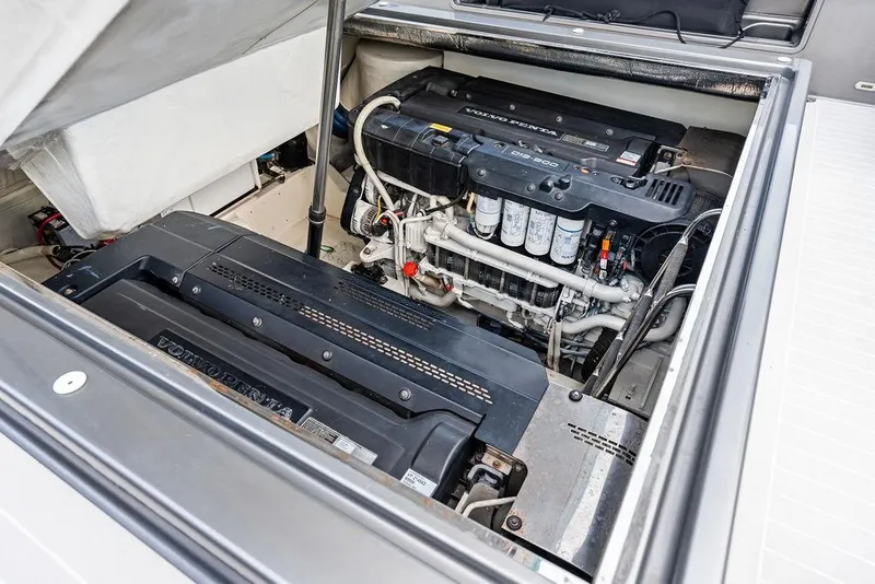 Slide: The Image of Engine compartment of a 2015 VanDutch 55 yacht, showcasing dual engines. - 35