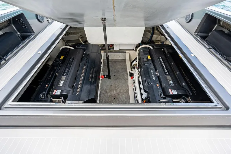 Slide: The Image of Engine compartment of a 2015 VanDutch 55 yacht, showcasing dual powerful engines. - 36