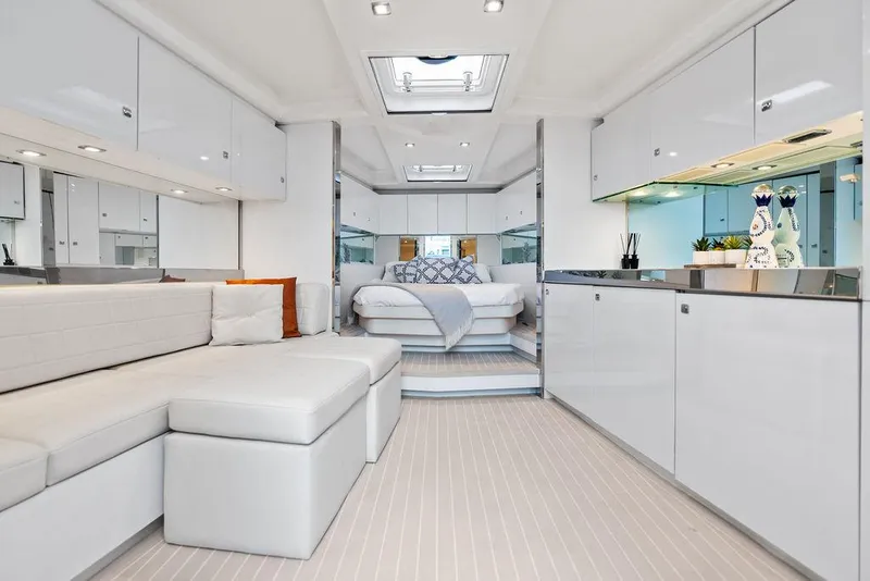 Slide: The Image of Luxurious interior of a 2015 VanDutch 55 yacht with modern white furnishings. - 39