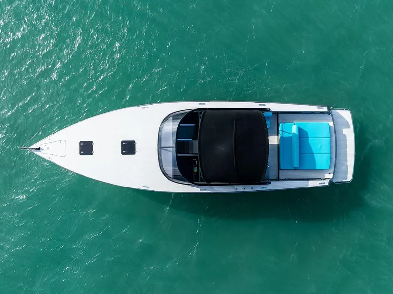 Slide: The Image of Aerial view of 2015 VanDutch 55 yacht on turquoise water. - 6