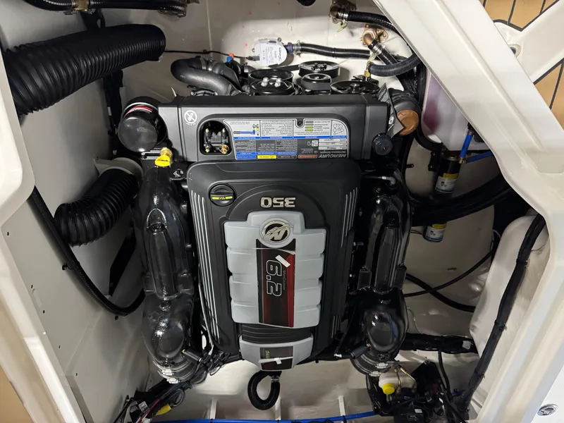 Slide: The Image of Engine compartment of 2026 Sea Ray SDX 250 Surf boat, featuring a powerful Mercury 6.2L engine. - 8