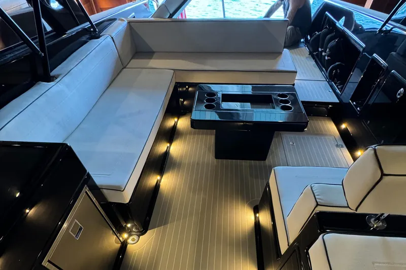 Slide: The Image of Luxurious interior of a 2019 VanDutch 40 yacht with elegant seating and ambient lighting. - 14
