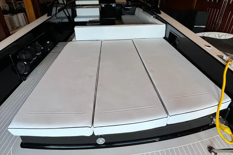 Slide: The Image of 2019 VanDutch 40 yacht with spacious white sunbed and sleek design. - 20