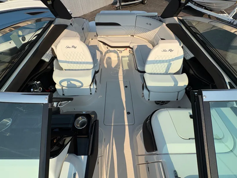 Slide: The Image of 2026 Sea Ray SLX 260 boat interior with luxurious seating and modern design. - 9