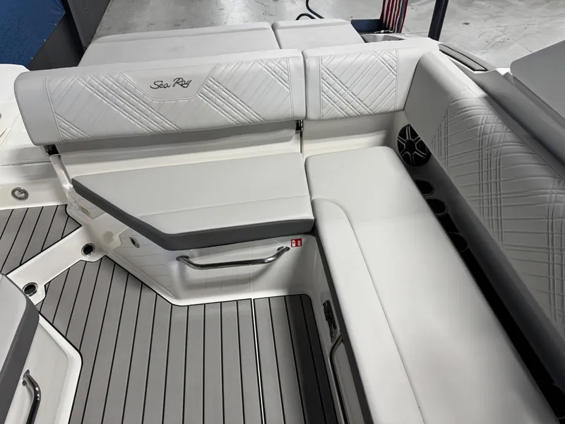 Slide: The Image of Luxurious seating on 2026 Sea Ray SDX 270 boat with elegant white upholstery. - 10